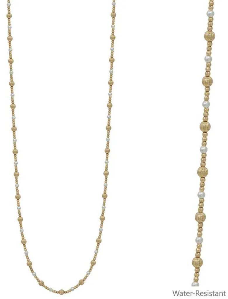 gold and pearl beaded necklace