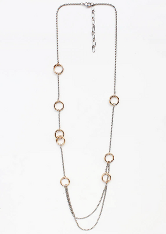 silver chain with double gold circle accents