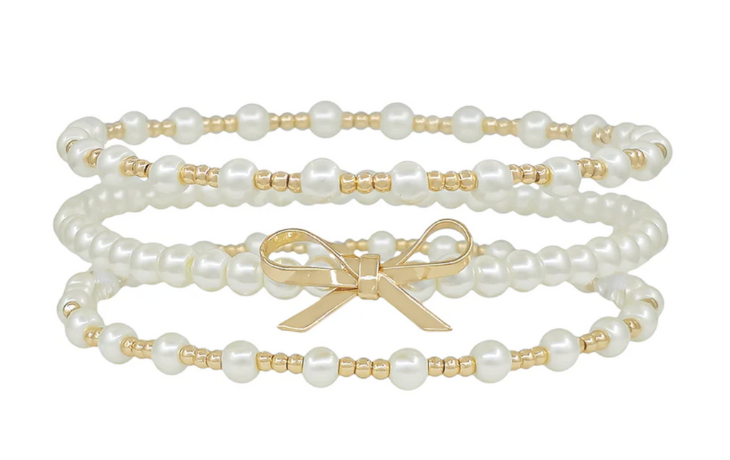 pearl, gold and bow bracelet set