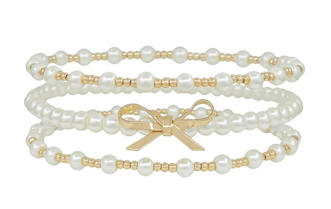 pearl, gold and bow bracelet set