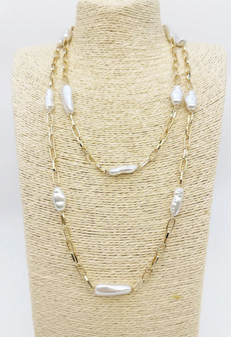 gold and oval pearl necklace