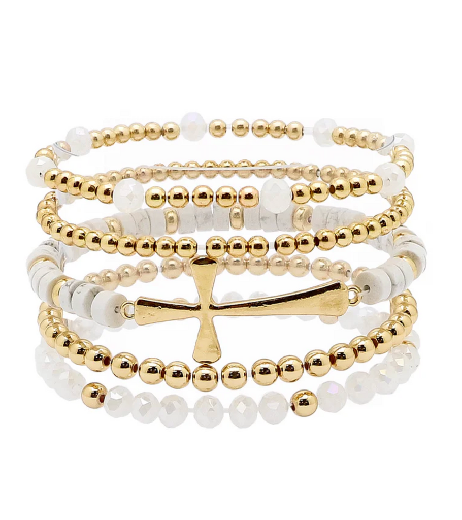set of 5 gold beaded bracelets with cross