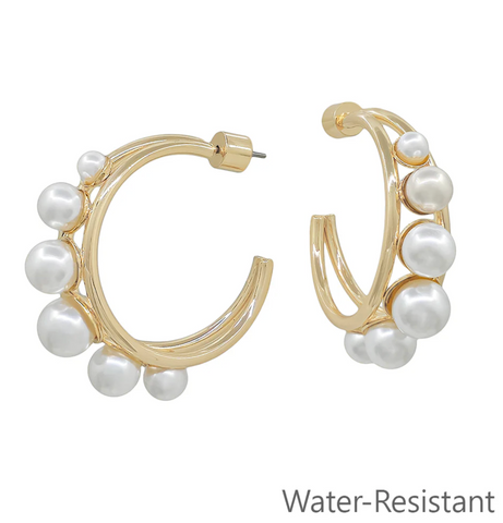 gold hoop earring with graduated pearl earring