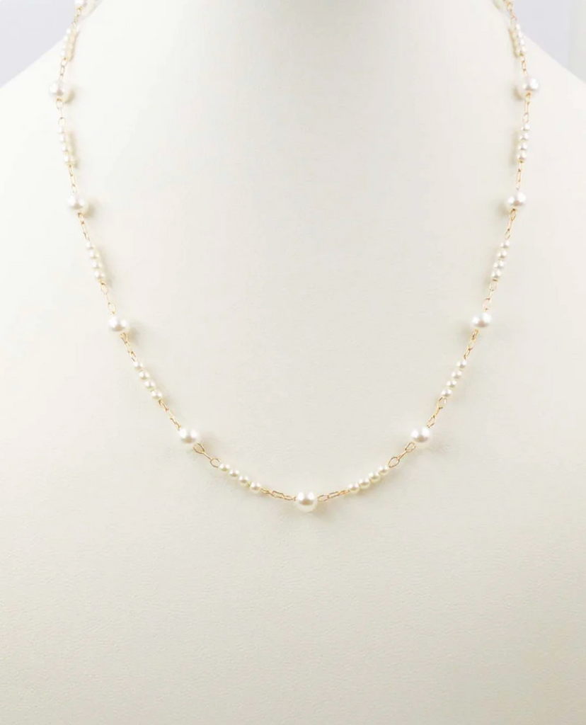 gold thin chain and pearl necklace