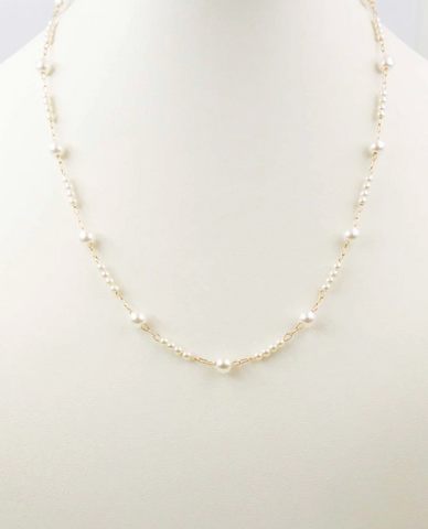 gold thin chain and pearl necklace