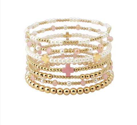 set of 7 stretch gold and pink bracelets