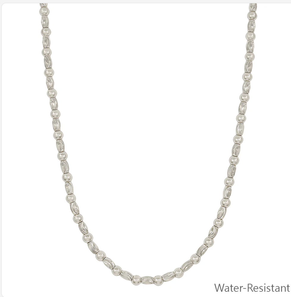 water resistant silver textured oval and gold necklace