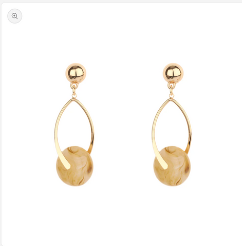 gold open metal drop with beige circle accent